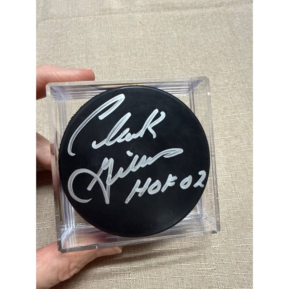 Clark Gillies Autographed Hockey Puck With HOF 02 Inscription In Display Case